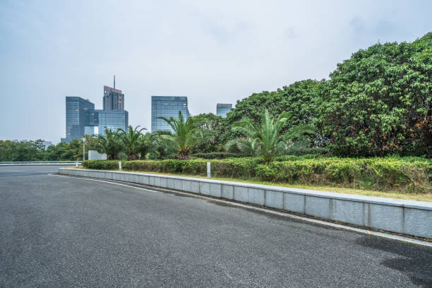 istock empty urban road with modern building in the city 1966968118