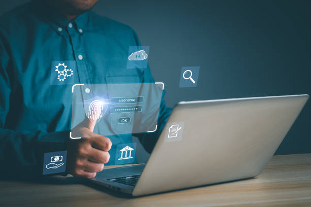 istock Concept Cyber security internet protection personal information. businessman fingerprint scanner Username and password for safety data on laptop and virtual interface lock. 1966983938