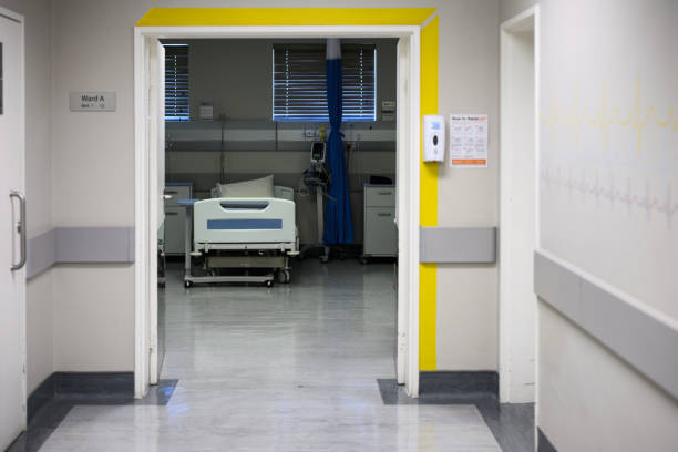 Beds in empty hospital ward