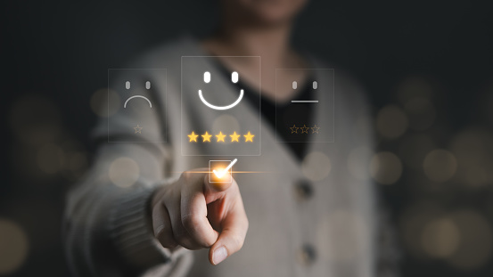Customer satisfaction experience survey concept. Woman give rating five star to excellent service experience on online application. user feedback, client review, business reputation evaluate, consumer