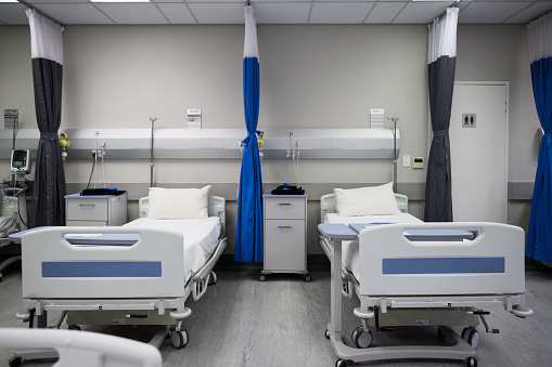 Digitally rendered image of a hospital intensive care unit with no people no patients