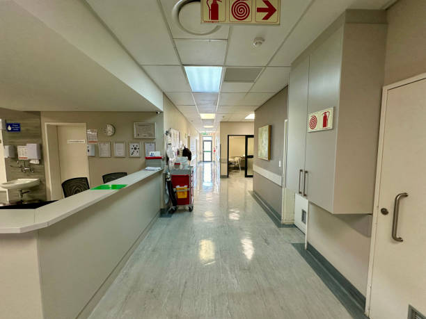 istock Empty hospital ward reception desk and corridor with diminishing perspective 1967022738