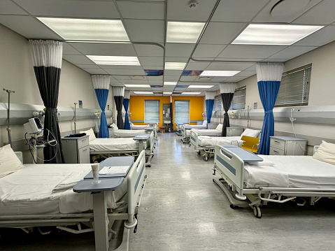 Beds in empty hospital ward