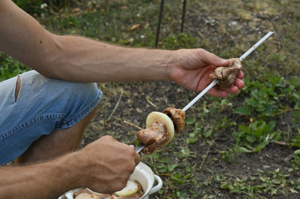 istock marinated meat is strung on a skewer for cooking shish kebab 1967038908