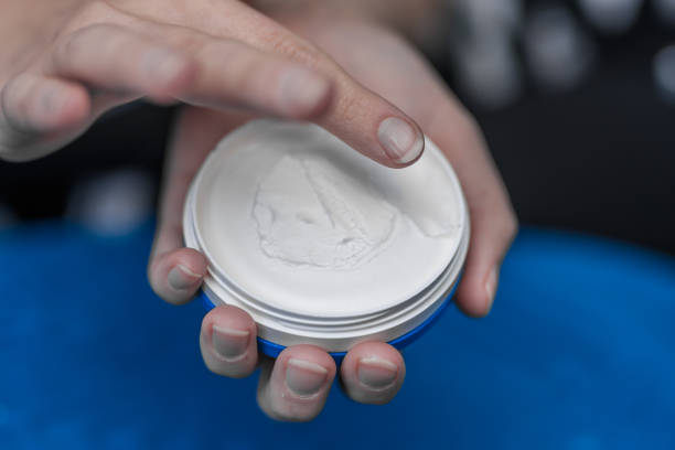 istock Moisturizing cream for dry skin in a round container 1967049088