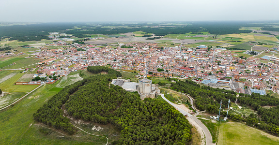 Aerial view of the Spanish town of Iscar in Valladolid, with its famous castle in the foreground.
