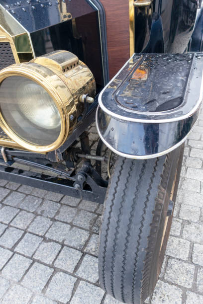 istock The front fender of a retro car with a headlight on it 1967140568