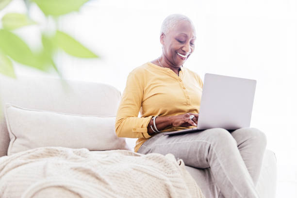 istock Senior Woman With Laptop at Home 1967201313