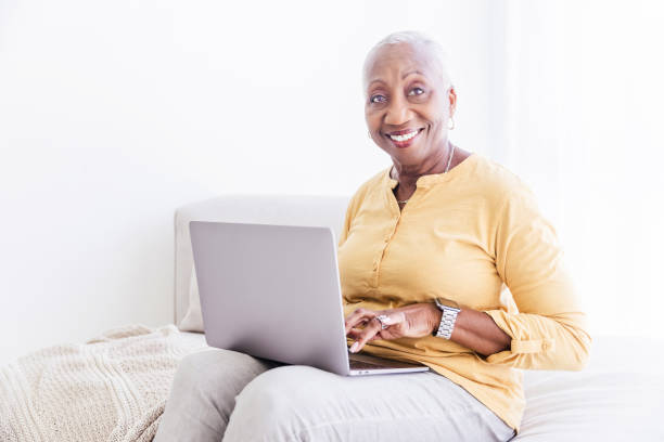 istock Senior Woman With Laptop at Home 1967201317