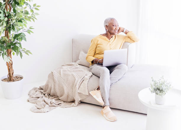 istock Senior Woman With Laptop at Home 1967201327