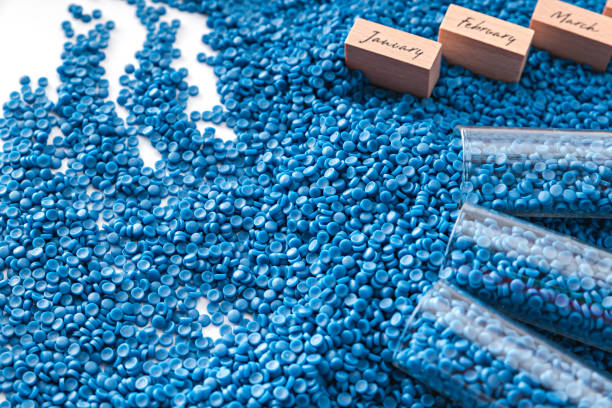 istock White plastic grain, plastic polymer granules,hand hold Polymer pellets, Raw materials for making water pipes, Plastics from petrochemicals and compound extrusion, resin from plant polyethylene. 1967205044