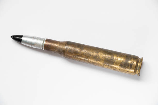 istock Armor-piercing bullet on a white background , weapons and cartridges 1967267342