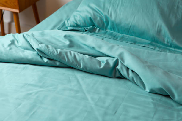 istock Messy baed mint cotton crumpled fabric 1967268905