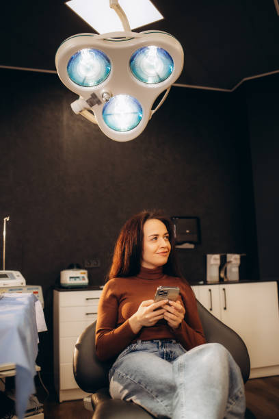 istock A beautiful young woman is waiting for an appointment with a plastic surgeon 1967273613