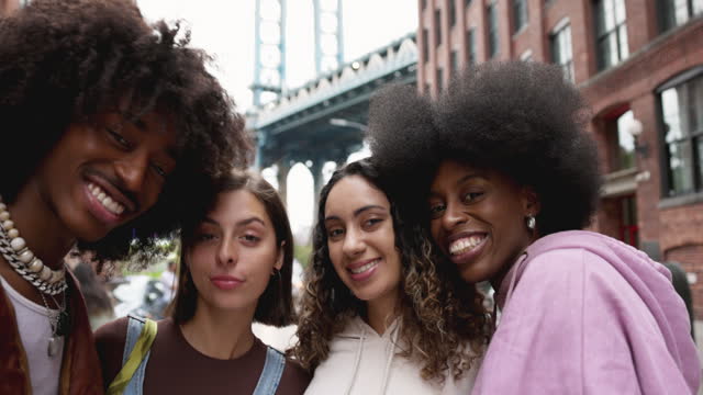 Multi-ethnic friends taking a selfie in New York