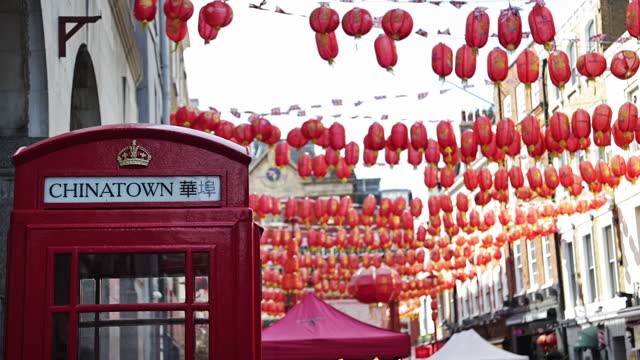 Chinatown London, Chinatown scene in the Soho district of Westminster City of London, Lampions in Soho London, chinese new year celebrations, popular tourist destination in London, chinese telephone booth