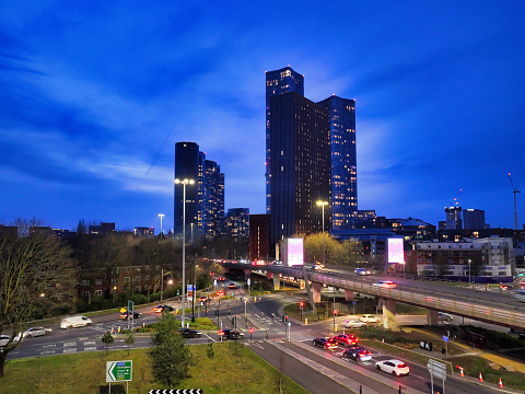 Aerial image of Deansgate skyscrapers in Manchester over Mancunian Way early evening