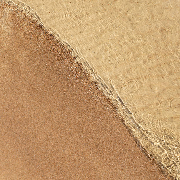 istock Beautiful sandy beach close up, top view. Square photo. 1967342117