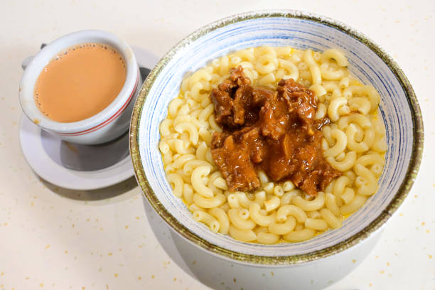 Hong Kong milk tea and Satay beef with macaroni in Tea restaurant, hong kong