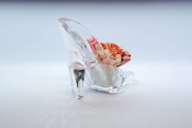 Preserved roses are placed in glass slippers