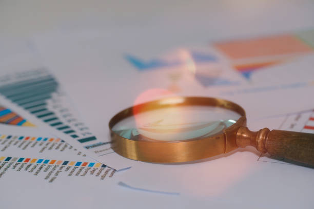 istock Magnifying glass on graph paper. Financial development, Banking Account, Statistics, Investment Analytic research data economy, Business concept 1967420388