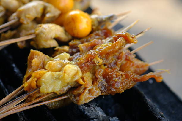 Sate Ambal is a chicken satay typical of the Kebumen area of Central Java. This satay is made from chicken meat seasoned with spices. Sate is cooked by grilling on a charcoal grill. Indonesian food.
