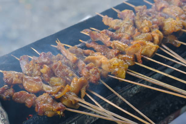Sate Ambal is a chicken satay typical of the Kebumen area of Central Java. This satay is made from chicken meat seasoned with spices. Sate is cooked by grilling on a charcoal grill. Indonesian food.