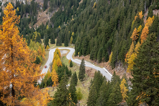 Scenic winding road at Maloja pass in Switzerland in autumn