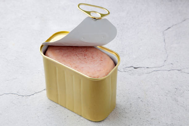 Canned luncheon meat with the lid opened
