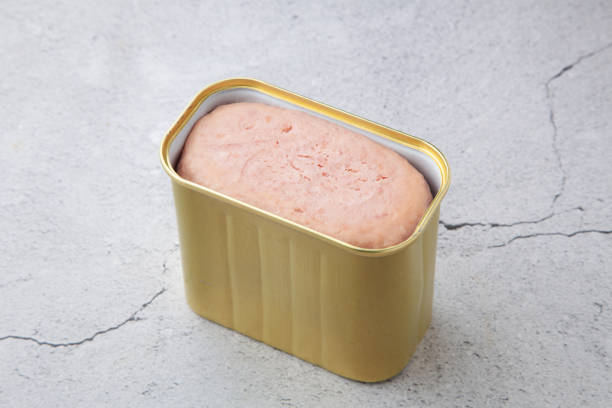 Canned luncheon meat with the lid opened