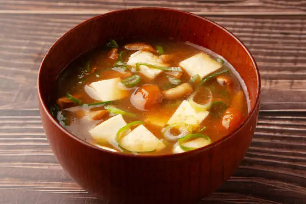 Akadashi miso soup with licked mushrooms and tofu
