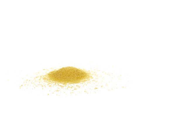 Heap of couscous isolated on white background