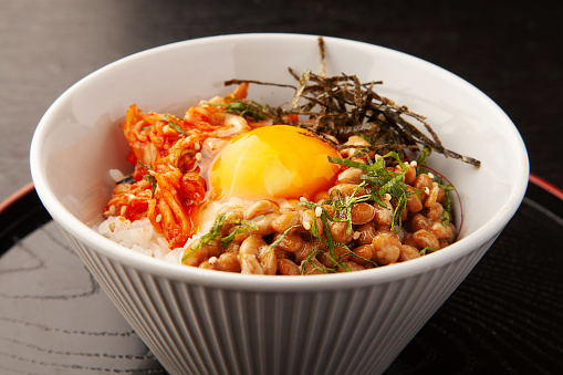 Bowl of natto, kimchi, and raw egg
