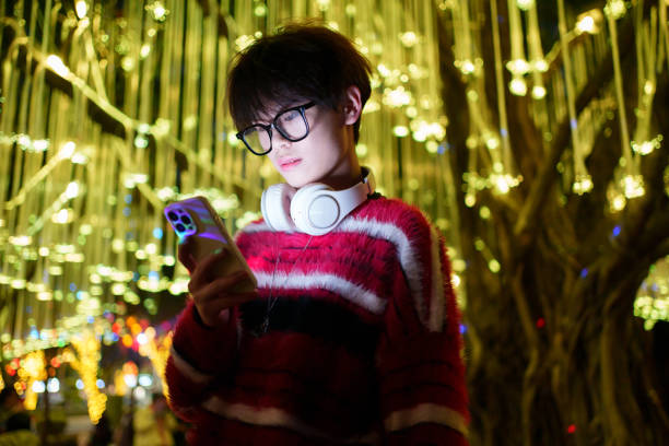 istock Young man looking at smartphone 1967535188