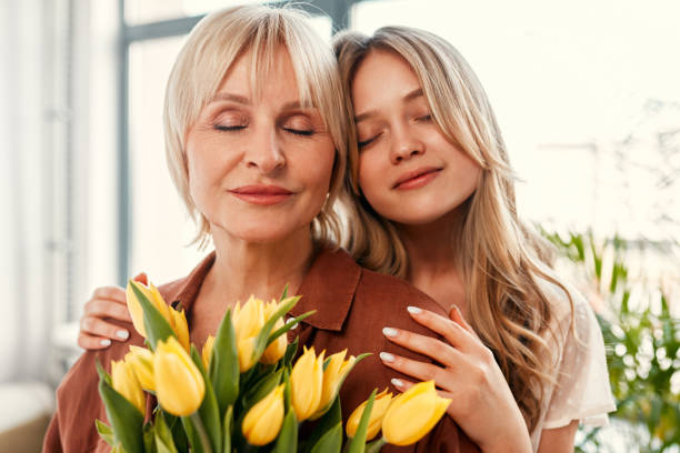 istock Mom and daughter isolated on background 1967535994