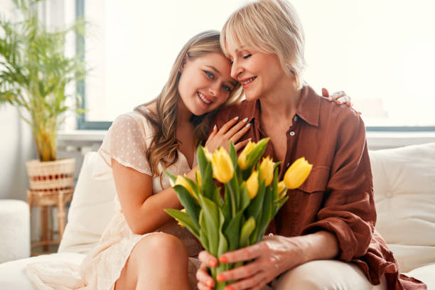 istock Mom and daughter isolated on background 1967536002