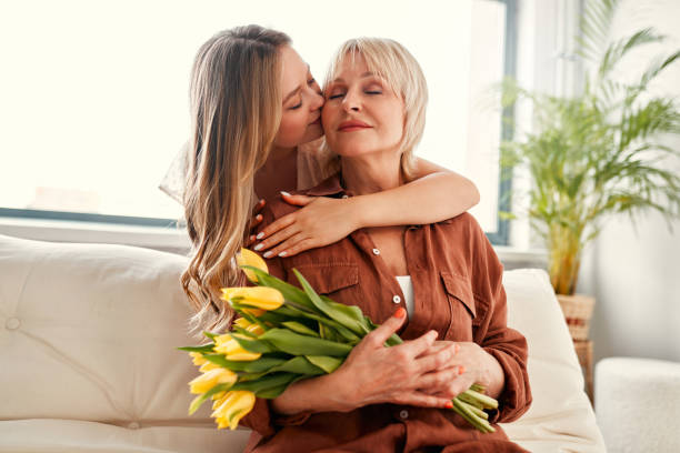 istock Mom and daughter isolated on background 1967536063