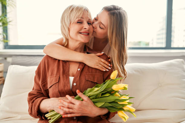 istock Mom and daughter isolated on background 1967536065
