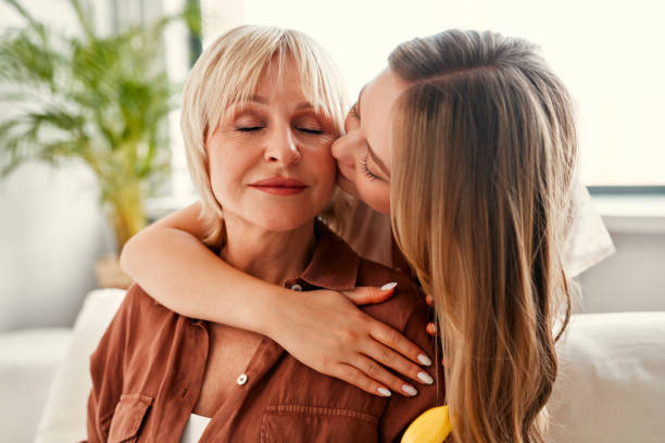 istock Mom and daughter isolated on background 1967536069