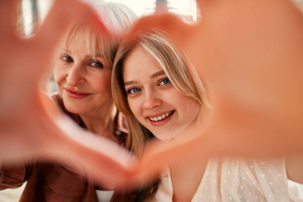 istock Mom and daughter isolated on background 1967536079