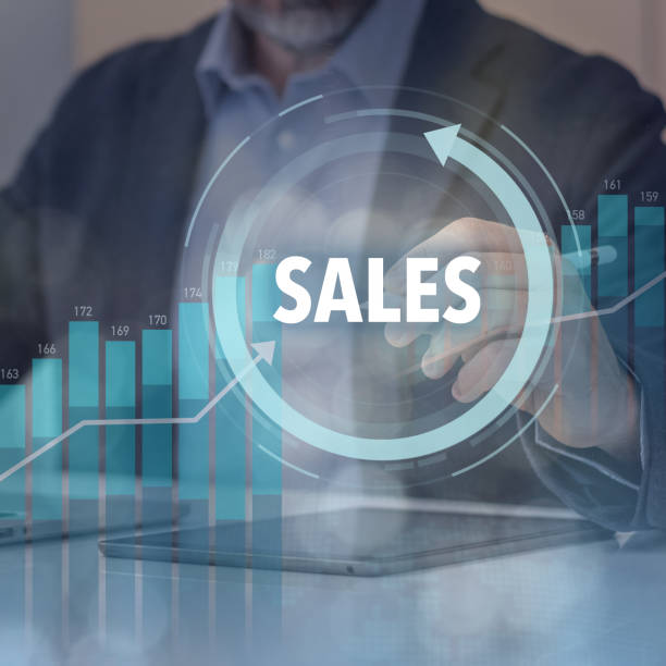 istock Businessman using laptop and tablet analyze economic charts and sales data on virtual interface 1967540107