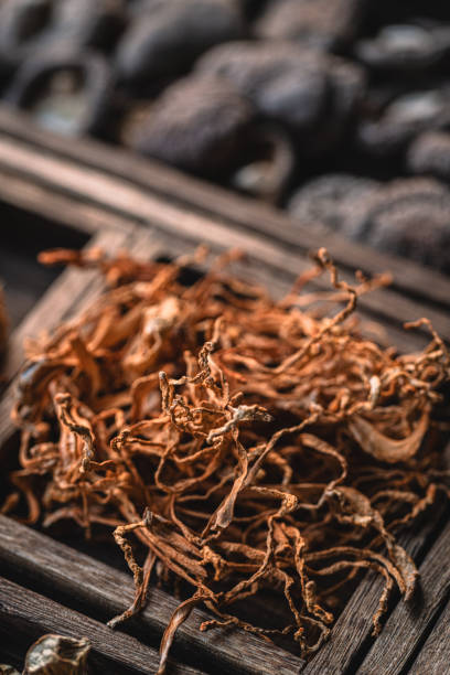 istock Dried mushrooms in wooden box 1967540691
