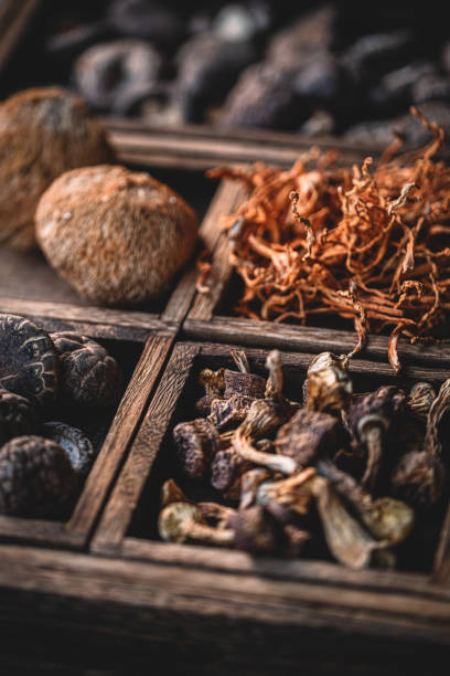 istock Dried mushrooms in wooden box 1967543550