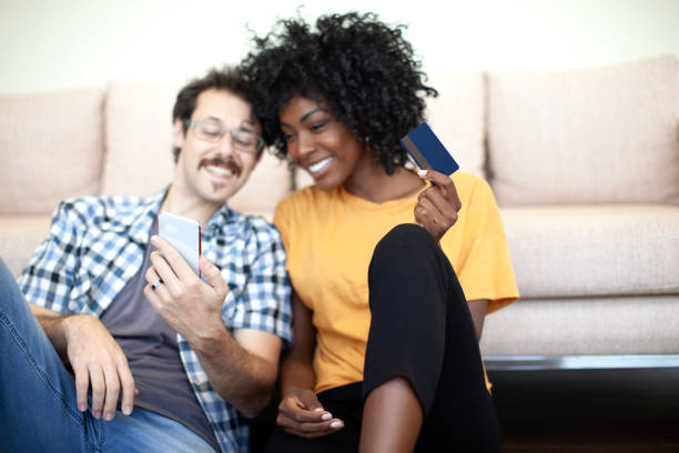 istock Happy couple shopping online 1967543583