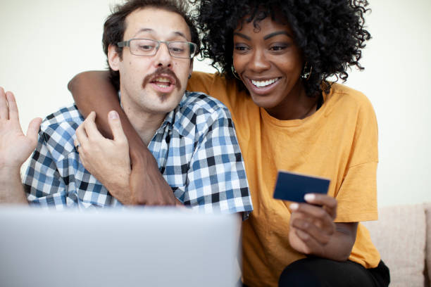 istock Happy couple shopping online 1967543584