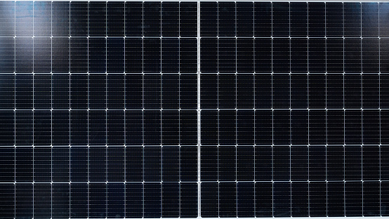 Solar Panels Against The Deep Blue Sky