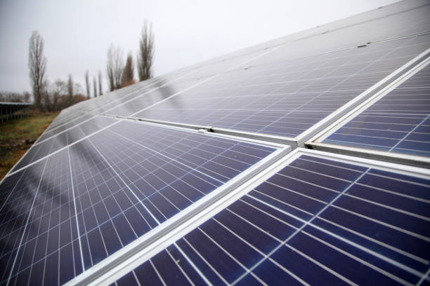 istock Solar panel. Solar panels installed in a rural area. Solar power plant in a field. Solar panel produces green, environmentally friendly energy from the sun. 1967544035