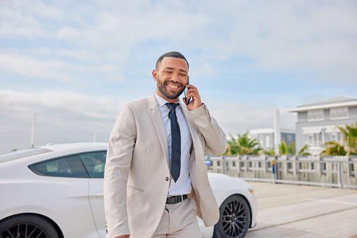 Travel, phone call and business man by car in parking lot for morning commute, transport and journey. Corporate, communication and person by vehicle on smartphone for conversation, chat and talking
