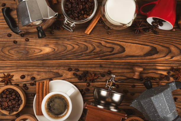 istock Ingredients for making coffee. Different ways to make coffee geyser moka maker,turkish coffee pots (cezve). Coffee making concept with milk, cinnamon and star anise. Flat Lay. Top view. Copy space 1967562141