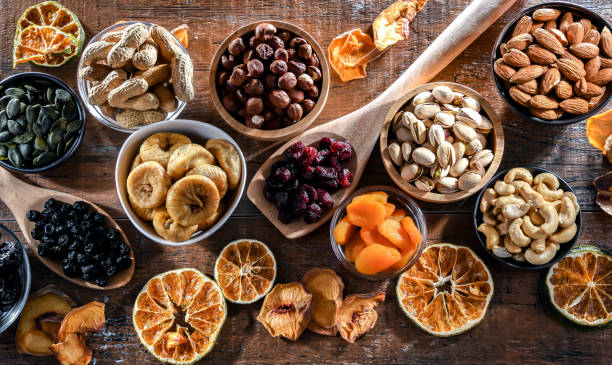 istock Composition with a variety of dried fruits and assorted nuts. 1967603800